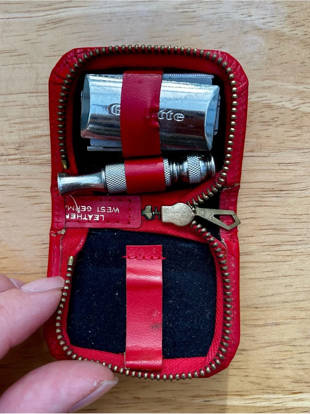 Vintage red Gillette travel safety razor kit